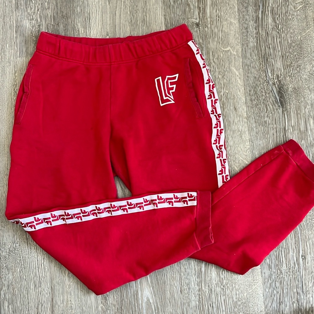 LF brand red jogger with side stripe detail